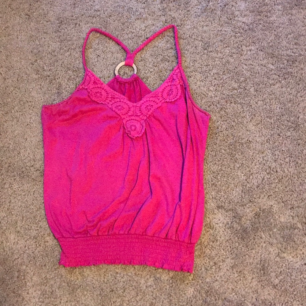 Pink ruffled tank top.